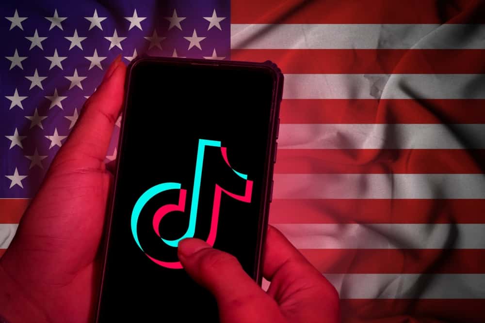 Scrolling Tik Tok with American Flag background
